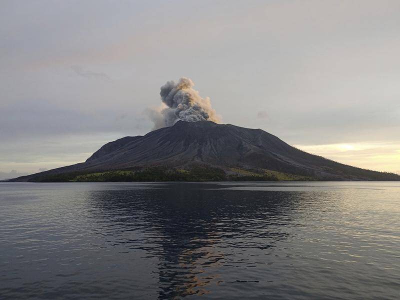 Following an eruption earlier this month, Indonesia's Mount Ruang is again spewing ash and lava. (AP PHOTO)