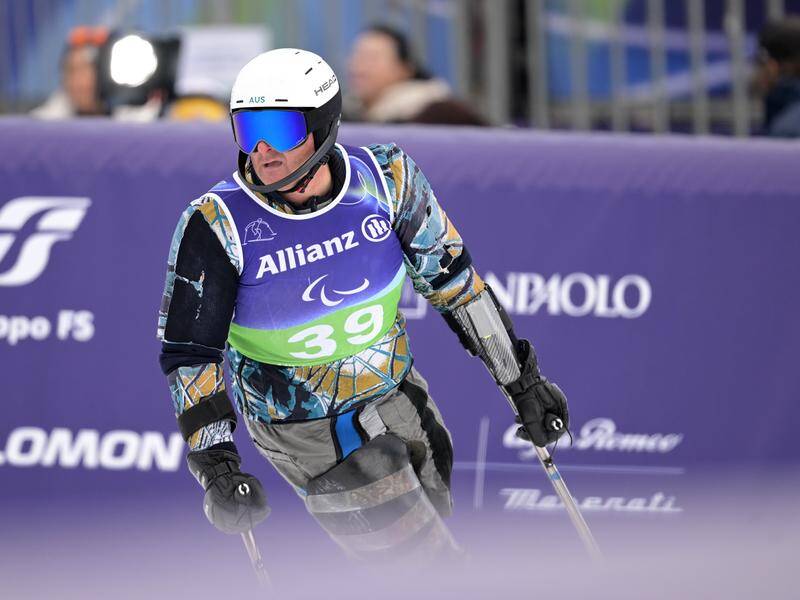In retro-gear Michael Milton delivered a much-improved 13th on his 20-year comeback Games. Photo: HANDOUT/SPORT THE LIBRARY