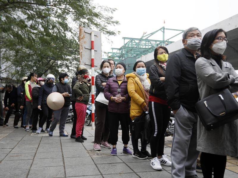 Vietnam has confirmed its 16th case of coronavirus, as people flock to buy protective masks.