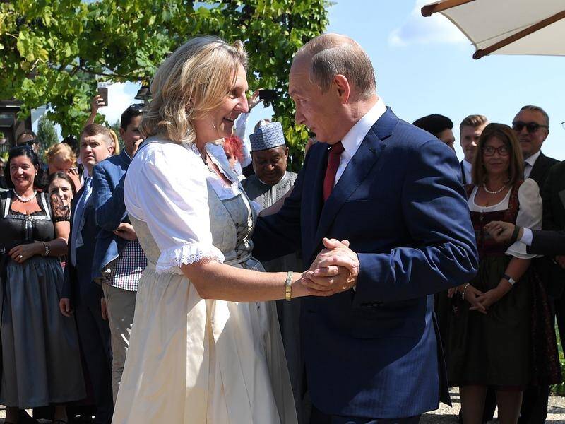 Vladimir Putin's presence at the wedding of Austrian minister Karin Kneissl has raised eyebrows