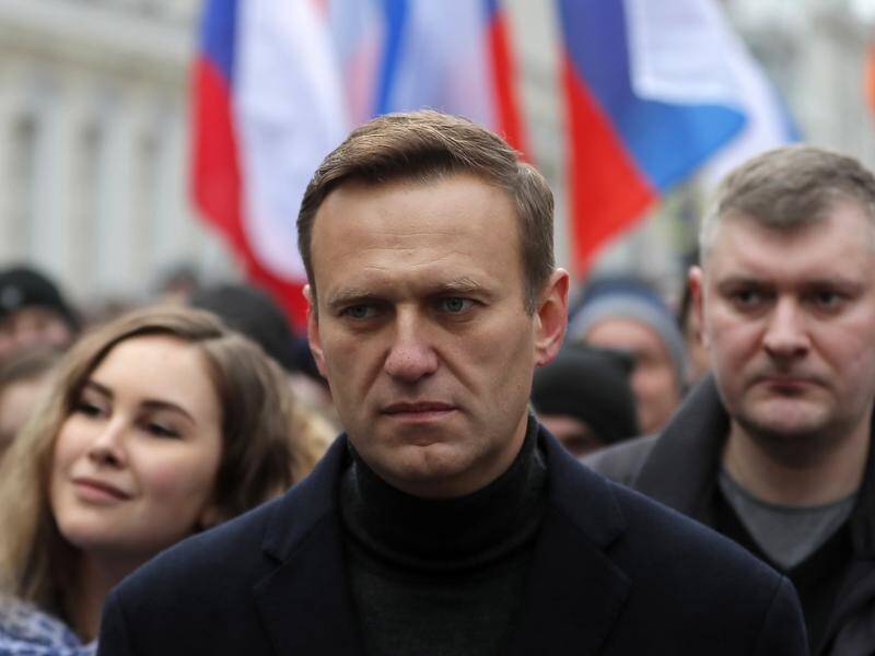 Russian opposition politician Alexei Navalny has posted a photo to social media of himself walking.