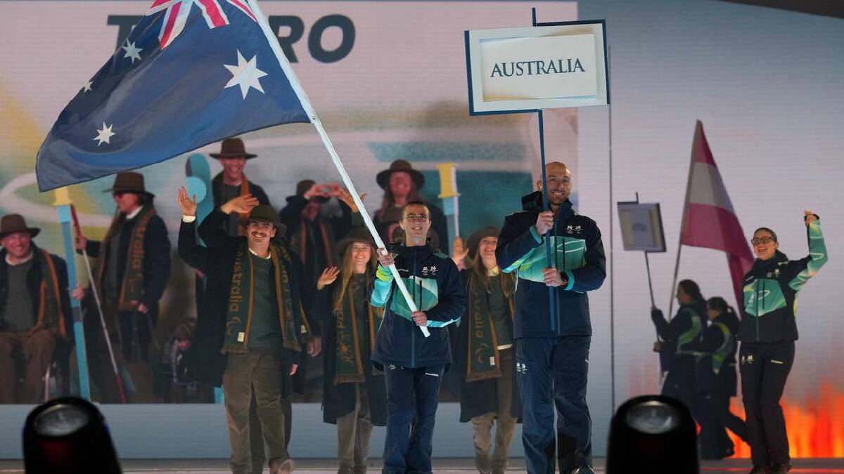Georgia Gunew flies the flag for Australia at the games. (AP PHOTO) Georgia Gunew flies the flag for Australia at the games. (AP PHOTO)