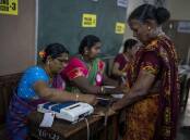 Polls have opened in India's national election, which involves almost one billion voters. (AP PHOTO)