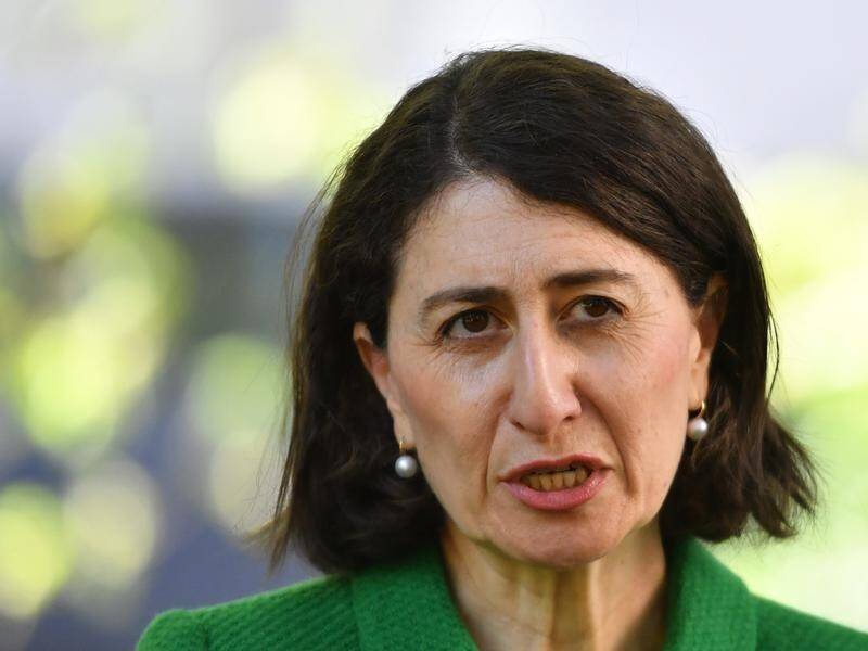 Gladys Berejiklian says NSW will trial a week-long home quarantine system for returned travellers.