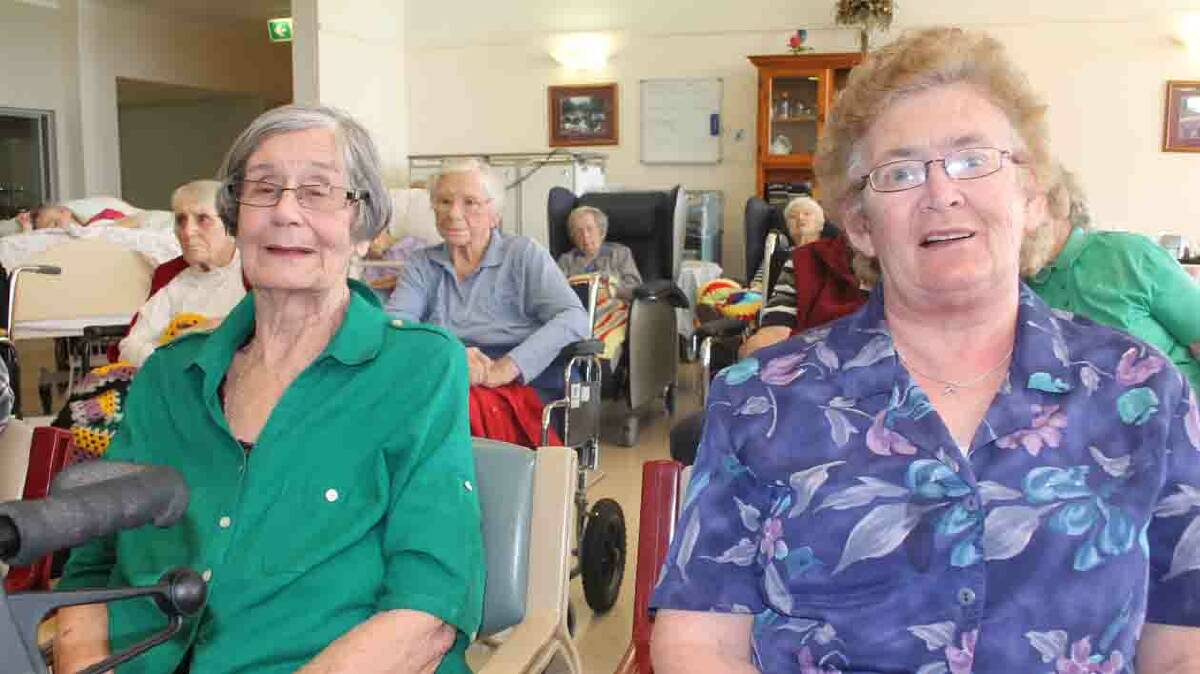  ALL SMILES: pictured (left) is Joan Ward with June Douglas at the Cootamundra Nursing Home on Monday.