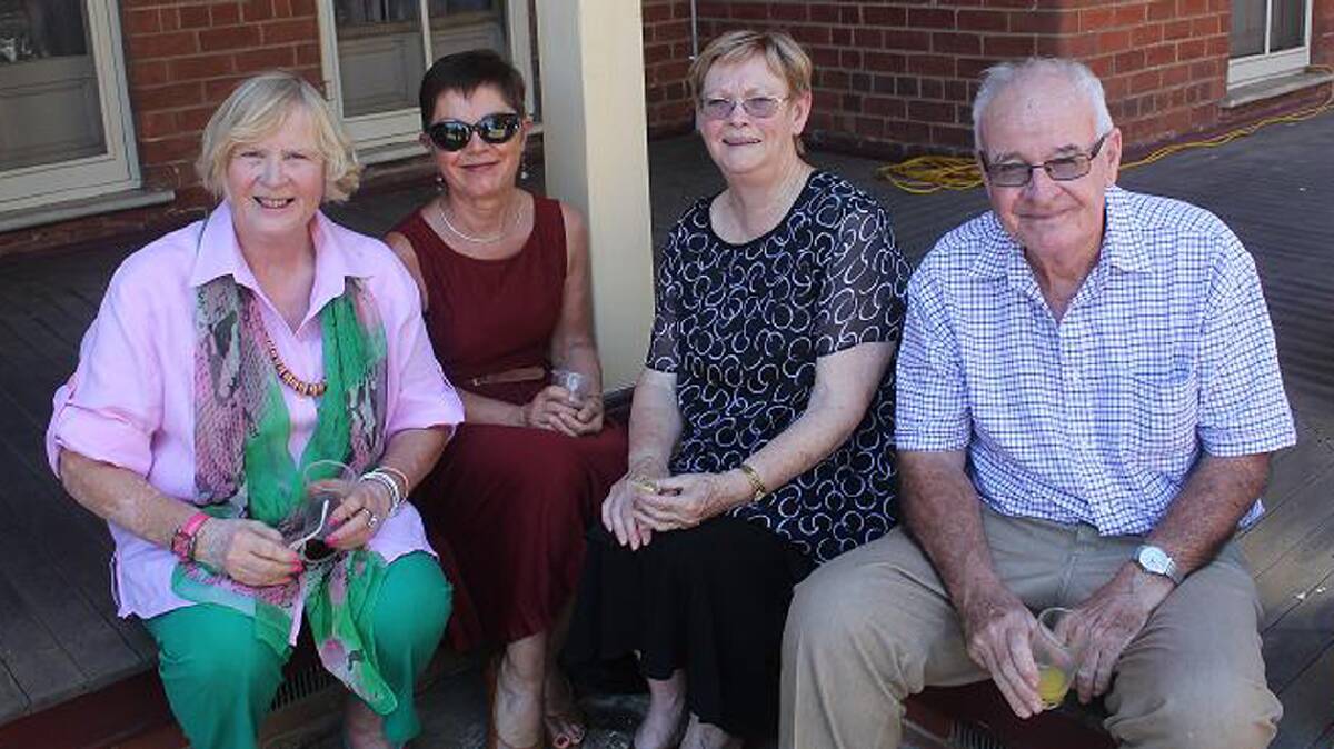  Enjoying the shade on the Presbytery verandah were (from left) Caroline Howse, Leigh Bowden and Val and Kevin Black.
