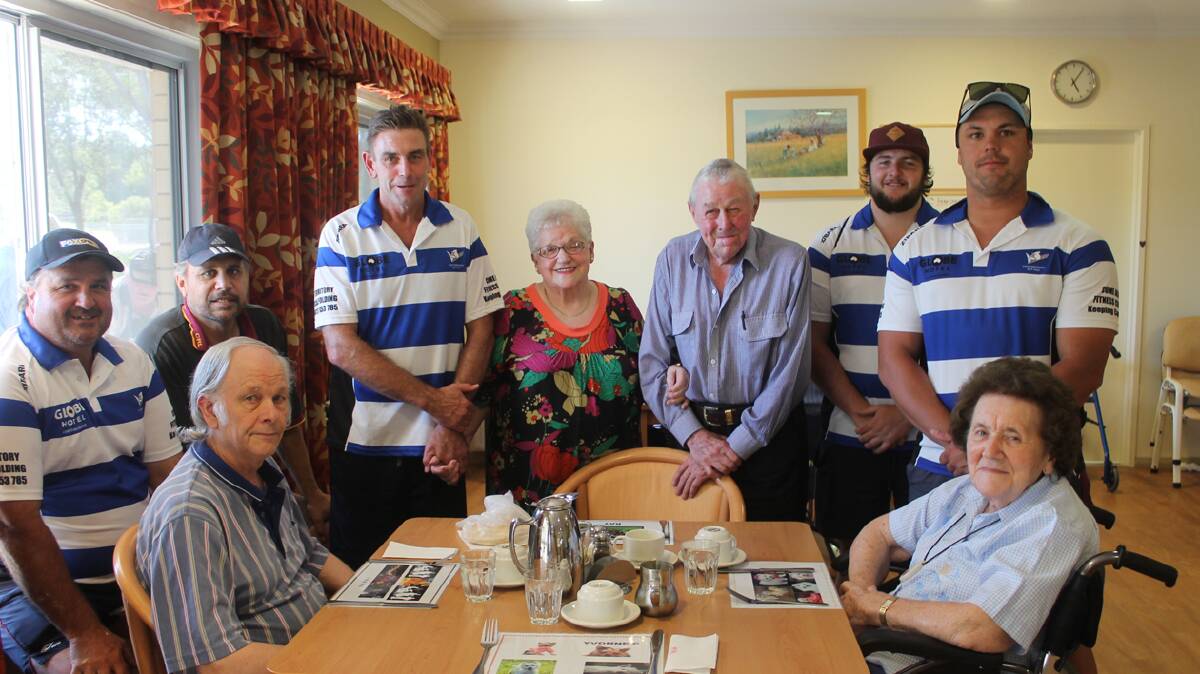  MEET AND GREET: Bulldogs players meet with residents at the Retirement Village last week. Pictured (clockwise from front left) are Frank Mackie, Wayne Berkrey, Mark Elia, Ashley Cooper, Yvonne Collingridge, Ray Clark, Andrew Bucknell, Luke Berkrey and Betty Bradley. 