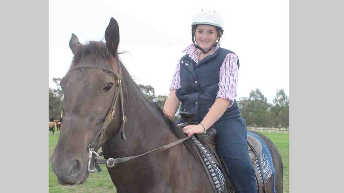  LOVE OF HORSES: Cootamundra’s Courtney Purtell enjoys herself as part of the Stock Fair Gymkhana, which was well attended by riders from across the district. 