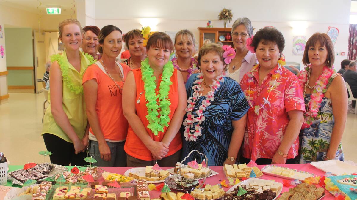  FUN FOR ALL: No staff member went without a Hawaiian flavour to their uniform during the recent, very successful, ‘Trip to Hawaii’ organised by the staff and volunteers for the Cootamundra Nursing Home. In addition to being fun the event served to raise funds for the Internal Sprinkler Appeal. 
