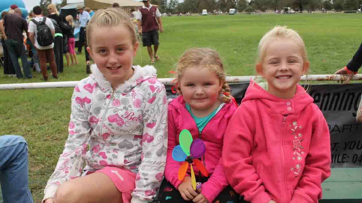  HAVING FUN: Wallendbeen girls Grace Hoey, Dusty-Rose Douglas and Josey Hoey had a great time at Stock Fair. 