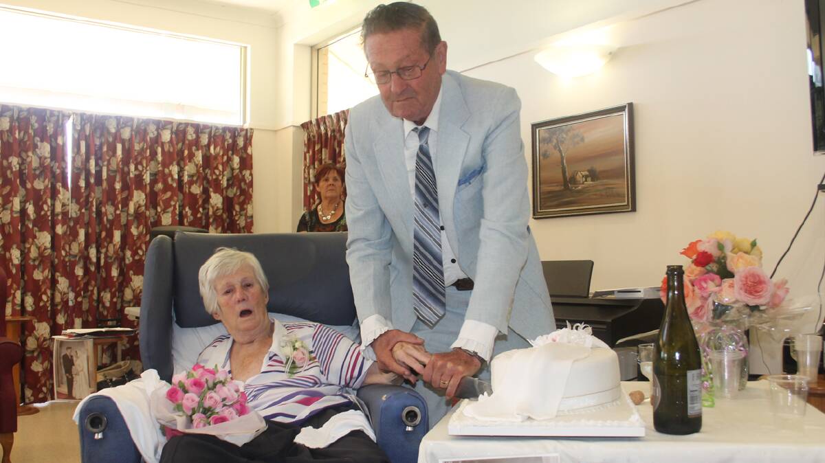  CELEBRATION: Pictured (left) is Cootamundra Nursing Home resident Helen Illingsworth with her husband Bill at the Nursing Home on Thursday. A special ceremony was held for the pair who will this week celebrate their 60th Wedding anniversary.
