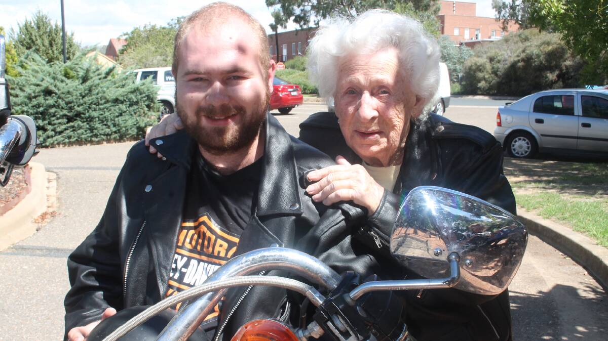  FUN FILLED: Hitching a ride with one of the Poker Run organisers Joel Bartholomew is Cootamundra Nursing Home resident Fay McColn. Joel is one of a number of young riders throwing their support behind the Cootamundra Nursing Home internal sprinkler appeal by staging a Poker Run on Saturday, April 5.