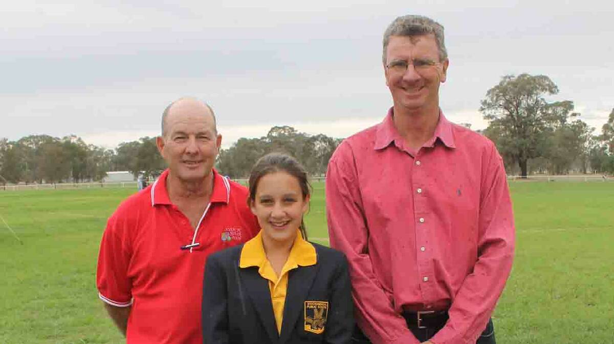 OFFICIAL OPENING: As per tradition Stockinbingal Public School captain Bianca Butler had the honour of opening the Stockinbingal Village Fair. She is pictured with fair president Grahame Halbisch (left) and school principal Colin Trickett. 