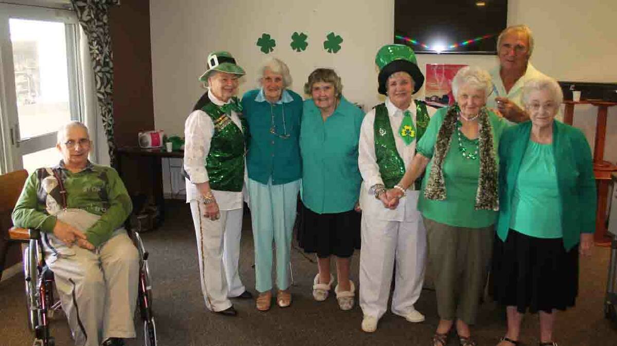  LUCK OF THE IRISH: pictured (from left) are Keith Dray, Temora Swingers singer Nancy Keys, Betty Manwaring, Ollie Wells, Temora Swingers singer June Coleman, Mary Pigram, Earl Kotzur from the Temora Swingers and Yvonne Sedgewick. The Temora Swingers performed at the Cootamundra Retirement Vilage as part of their St Patrick’s Day Celebrations.