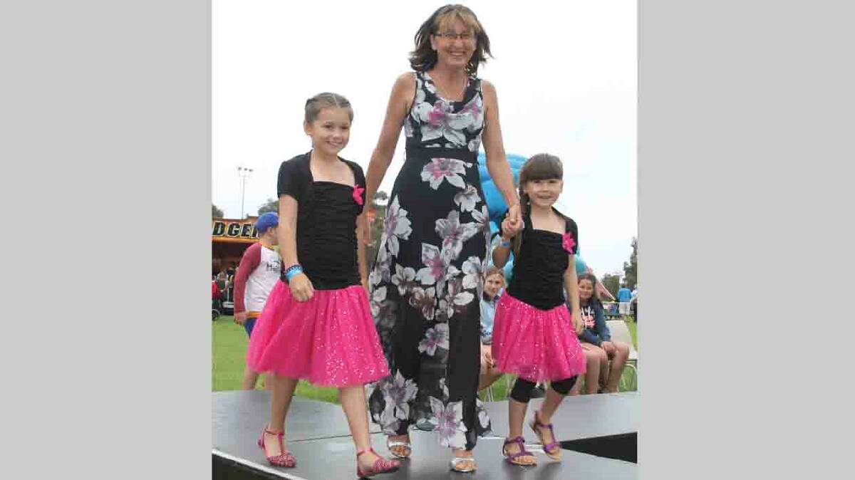  GREAT GIRLS: The Stock Struts Fashion Parade, sponsored by Hy Fashion, was terrific fun, supported by local models. Stockinbingal’s Estelle Large with daughters Grace (left) and Lilly strut their stuff. 
