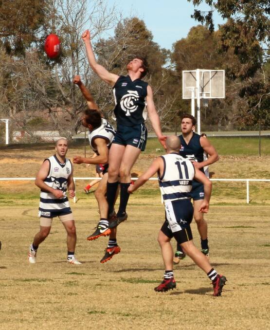 IN THE AIR: Blues' ruckman Sam Baldock contests the ruck against the Southern Cats on Saturday. Photo: BELINDA HOLT