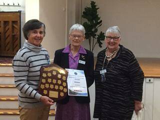 HONOURED: Elizabeth Bassingthwaighte with her award for publicity, Wallendbeen branch, with Margaret Smith, Bellarwi branch and Tina Billing, Hume Group president.