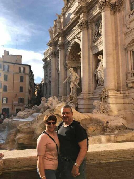 MAGNIFICENT ROME: One of the highlights of Anne Lawson's European vacation was time spent in Rome. She is pictured here at Trevi Fountain with her husband Peter Lawson. 