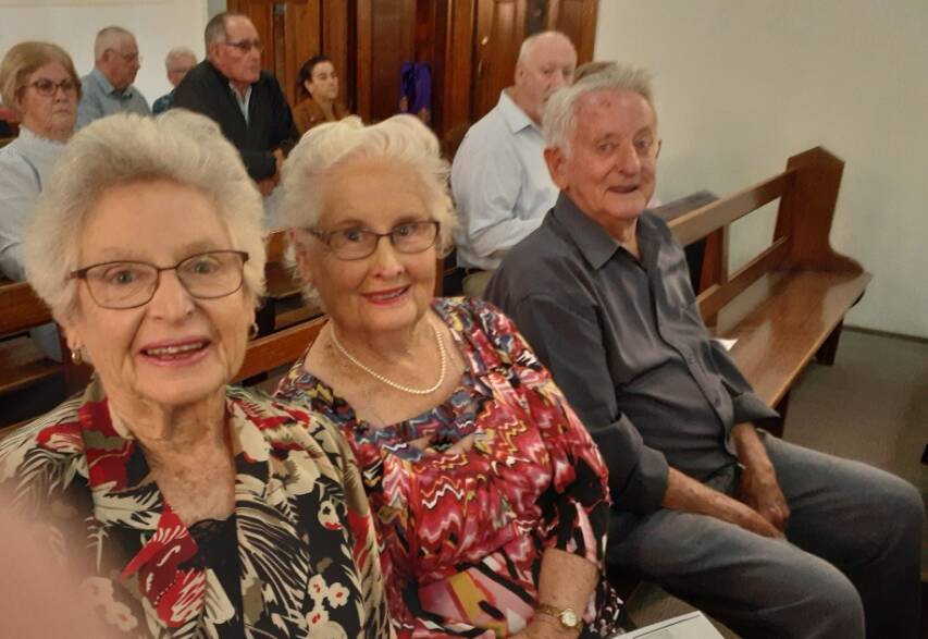 INSTALLATION CEREMONY: These Cootamundra residents Margaret Large, Marie & Neill Murray were present in Harden at Fr. Lolesios impressive Installation Ceremony.