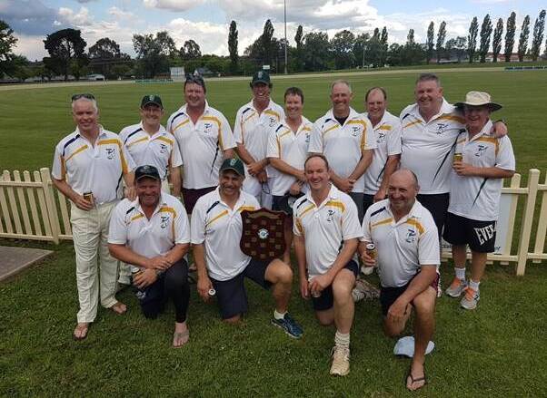 READY: Riverina team is (back l to r) Gerard Hines (Young), John Grimble (Sydney) Peter Stimson (Temora), David Bolger (Wombat), Eric Koetz (Wagga), John Stephens (Cootamundra), Brian Rotherham (Leeton), Paul O’Malley (Mount Macedon Vic) and Tom Purcell (Batemans Bay) with (front l to r) Peter Gerhard (Temora), Mark Elia (Cootamundra; Capt.), Peter Hamblin (Young) and Mark Favell (Griffith)