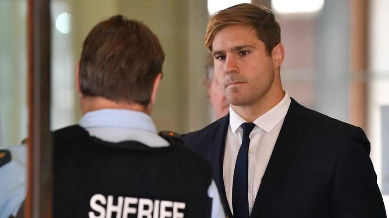 IN COURT: Former Cootamundra junior Jack de Belin arrives at Sydney Downing Centre on Wednesday for the start of his retrial over allegations he and Callan Sinclair sexually assaulted a woman in a North Wollongong unit. Picture: AAP