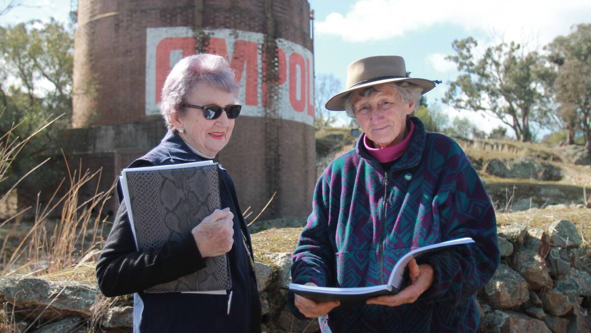 TALKING HISTORY: Margaret Fuller and Louise Halsey piece together parts of the former World War II and Ampol fuel depot's history during a site visit. Photo: Declan Rurenga