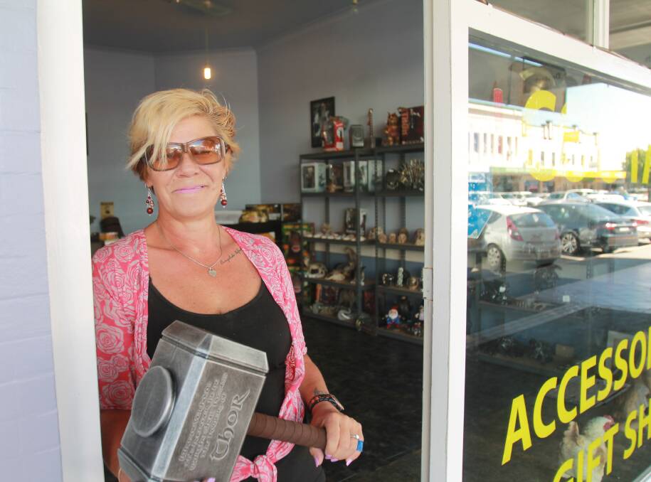 THOR'S HAMMER: Karen Schmidt has made the tree-change from Melbourne and has opened Coota's Accessories and Gift Shop. Photo: Declan Rurenga
