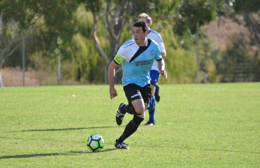 THE BEAUTIFUL GAME: Strikers co-coach Adam McPhail scored a brace of goals as the first grade men beat South Wagga 3-1 on Sunday. Photo: Declan Rurenga