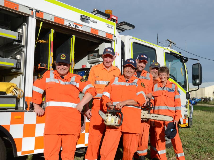 SES volunteers Leanne Anderson, Wagga's Patrick Wood, Carla LeBreton, Wagga's Rhys Dever and Cootamundra's Chris Laurence and Shirin Baxter after helping residents following Tuesday's storm. Photo: Declan Rurenga
