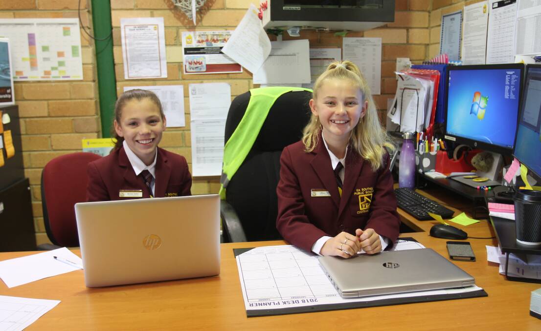 RUNNING THE SHOW: Kerstyn Taylor and Lilliana Chick running EA Southee Public School, in principal Leonie Stevenson's place for a day. Photo: Declan Rurenga