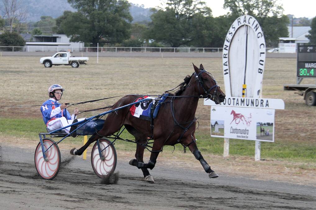 Strathlachlan Andy crosses the line clear in front with driver James Harding to win the Wattle Time Cup in 2016. Photo: Kelly Manwaring