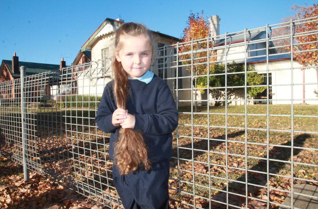 LONG WAY DOWN: Ava Perry will be donating 36 centimetres of her hair to make a wig for children who have lost their hair. Photo: Declan Rurenga