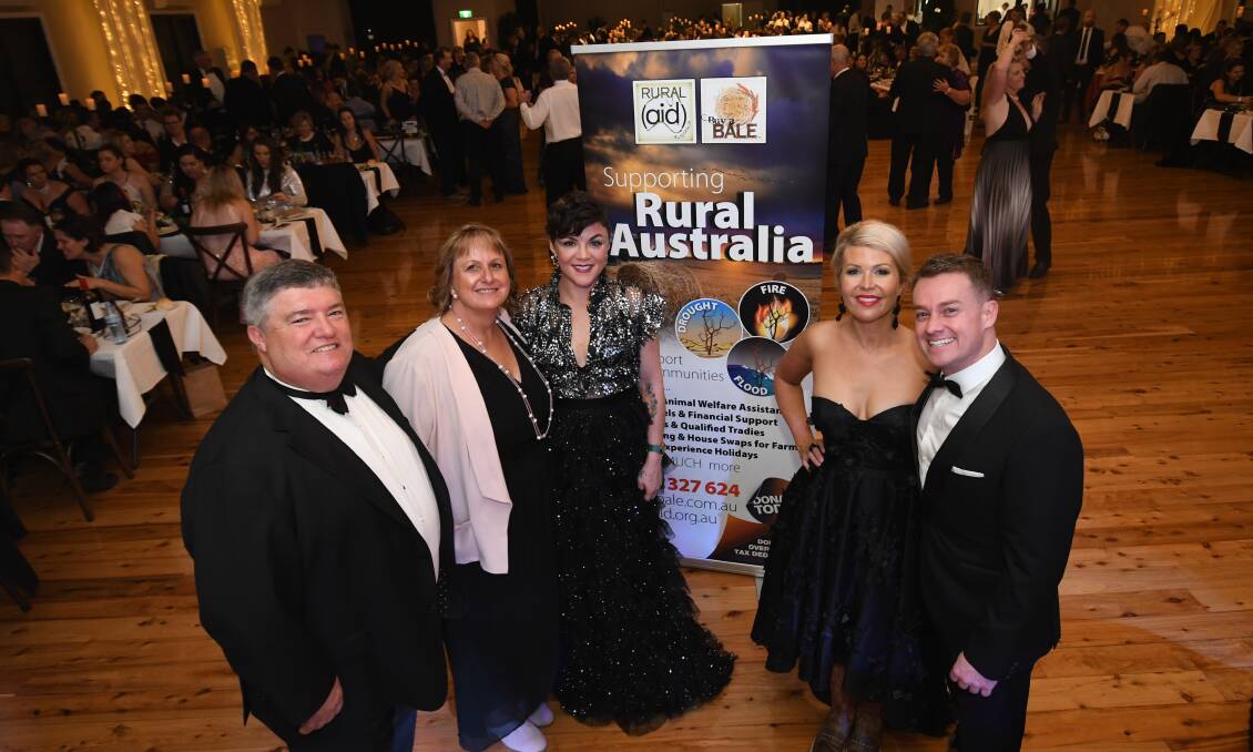 FUNDRAISING: Rural Aid founders Charles and Tracy Alder, with Em Rusciano, and Rural Aid ambassadors Chezzi and Grant Denyer at the Black Tie and Boots Ball in Bathurst in August, 2018 which raised $150,000 in one night for the charity. Photo: CHRIS SEABROOK 081118cboots