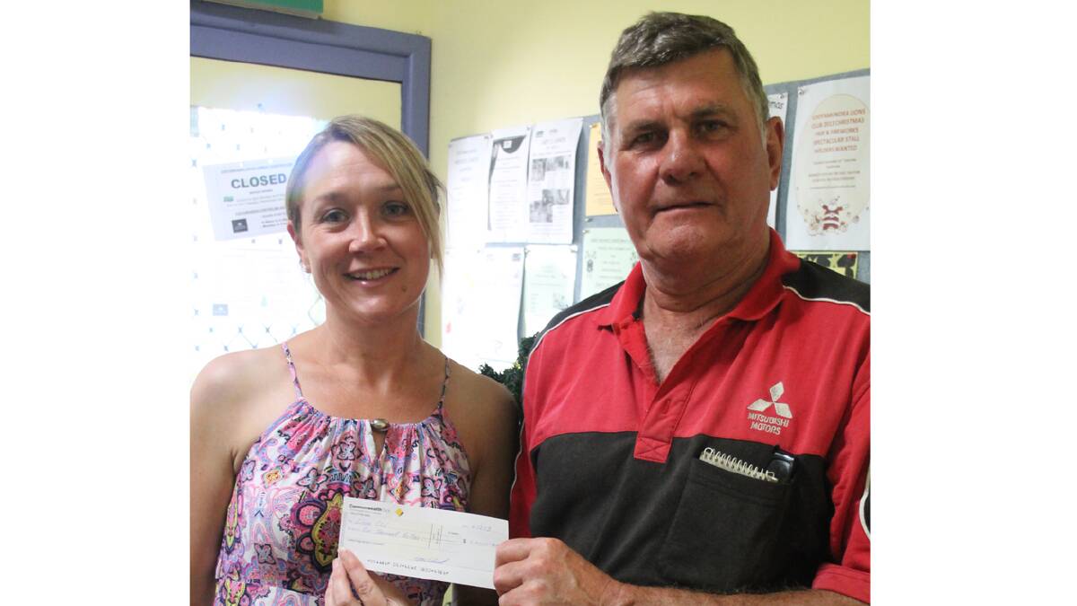 STRONG SUPPORT: It is the third year in a row that Christine Wishart’s Dance Studio has made a donation to the Lions Train to ensure it keeps offering joy to local children. Christine is pictured with Lions Club President Paul Basham accepting a donation, which were the proceeds of the studio’s end of year  concert.