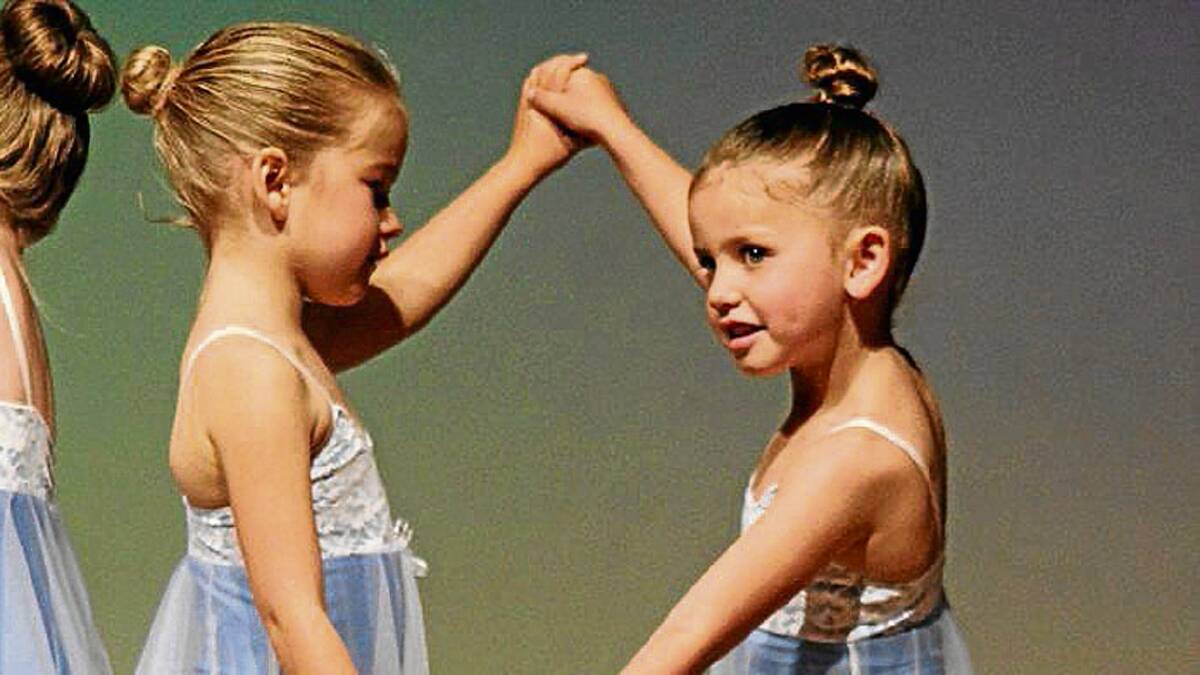 TOO CUTE: Little dancers Matilda Blackney (left) and Amarli Kelleher are pictured during the end of year concert.