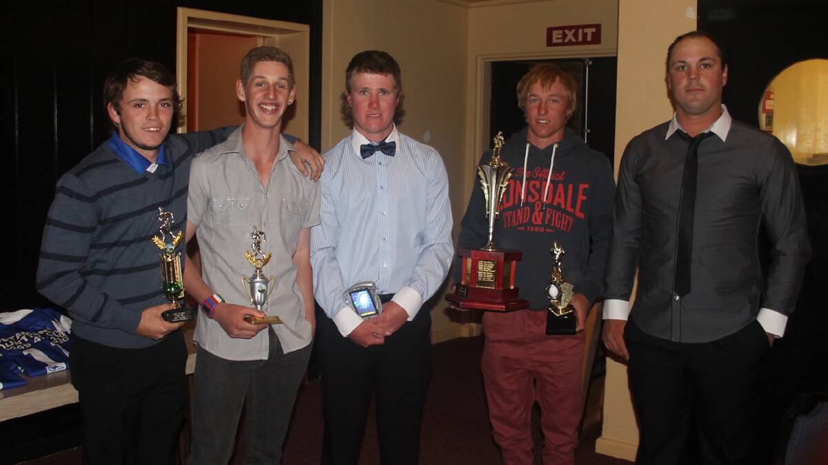 UNDER 18S WINNERS: pictured (from left) are Tommy Connell (Best Forward), Alex Jones (Best Back), Jacob Prosser (Players’ Player), Patrick Cameron (Best and Fairest/ John Crick Memorial) with coach Luke Berkrey at the Bulldogs presentation.